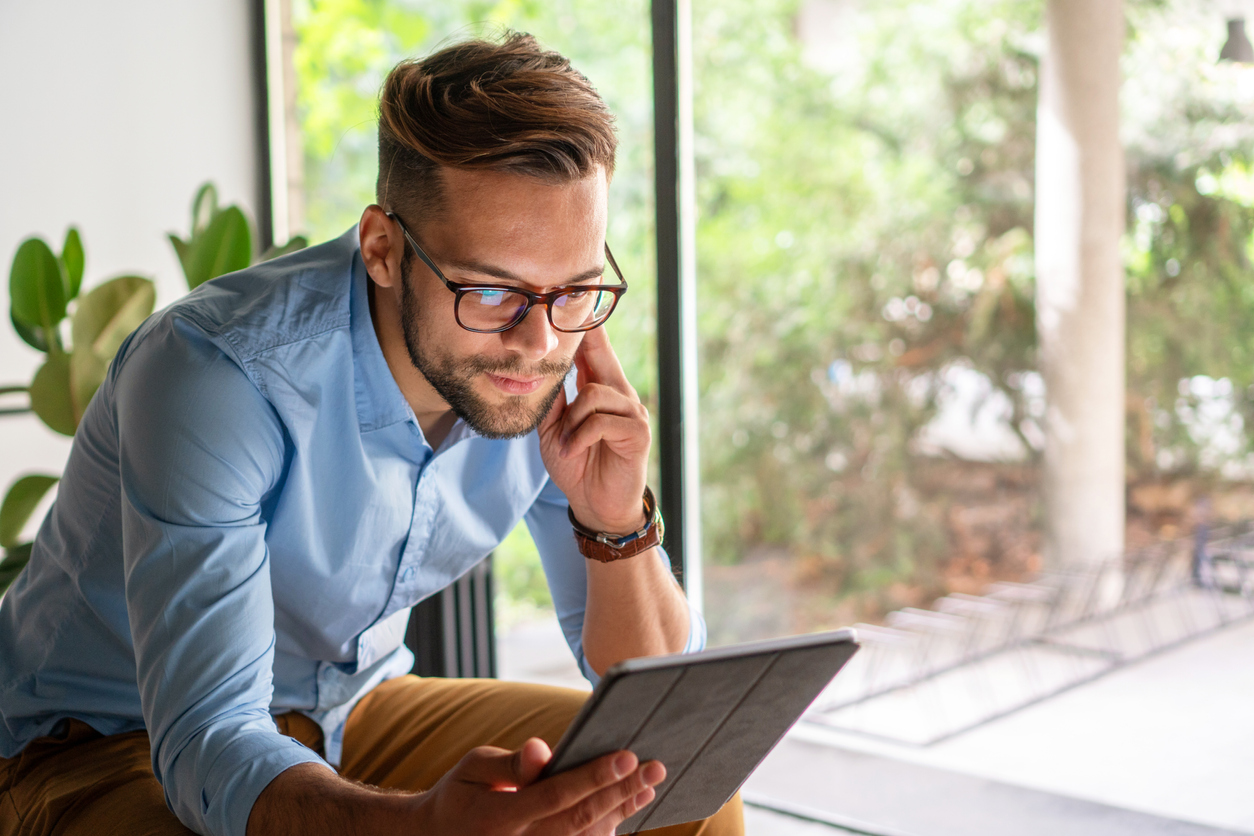 Man reading about automated email series in Mailchimp