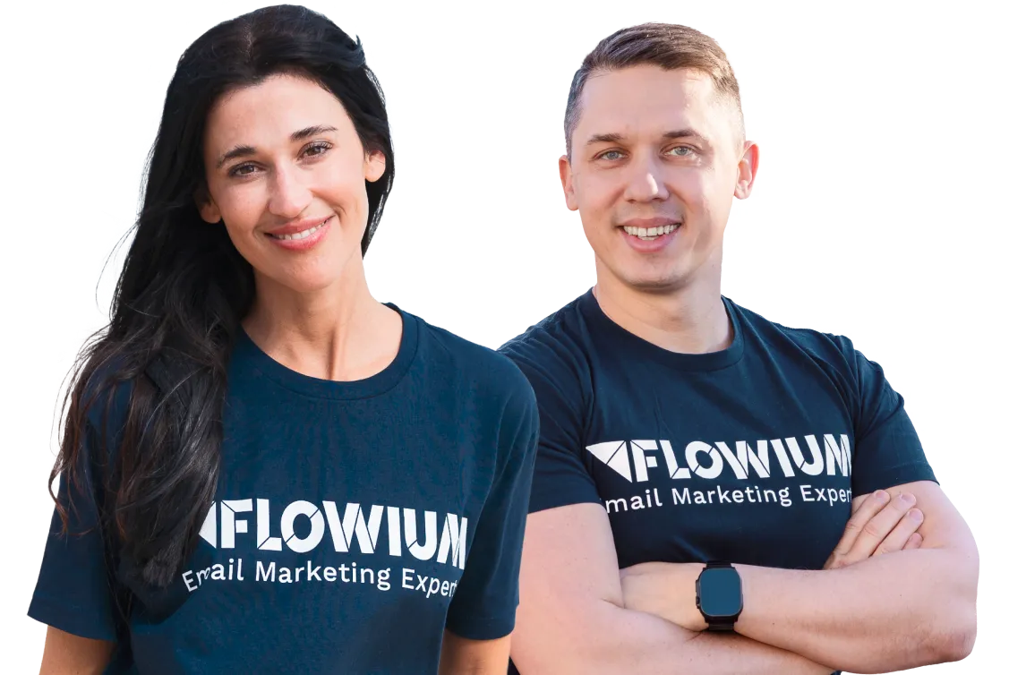 Two smiling Flowium team members wearing branded T-shirts, standing side by side.
